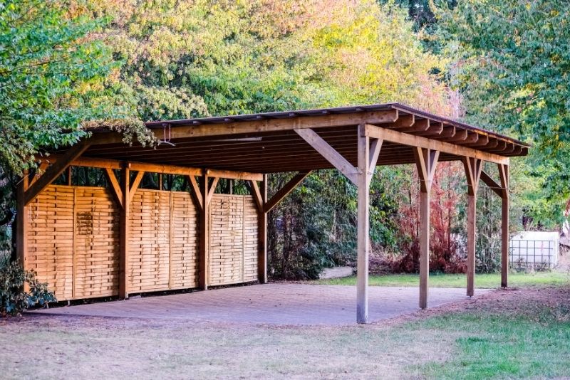 Close-up of a steel carport frame with polycarbonate roof sheeting